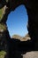 Unique rock formation, cave and blue sky, Antrim coast, North Ireland