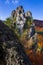 Unique rock formations, bizarre rock towers with autumn colors of leaves on the trees.