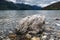 Unique rock on a peaceful lake in the Canadian wilderness