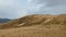 A unique sandy mountain in the Caucasus on a cloudy day.