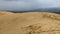 A unique sandy mountain in the Caucasus on a cloudy day.