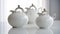 unique shapes and curves of vintage pots against a white background