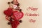 Unique stylish red hearts and cookies on craft background, happy