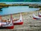 Unique tribe carving boats in ports. A local aboriginal tribe of Lanyu island, Taiwan - Yami / Tao.