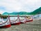 Unique tribe carving boats in ports. A local aboriginal tribe of Lanyu island, Taiwan - Yami / Tao.