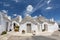 Unique Trulli houses, traditional Apulian dry stone hut with a conical roof in Alberobello, Puglia, Italy