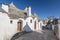 Unique Trulli houses, traditional Apulian dry stone hut with a conical roof in Alberobello, Puglia, Italy