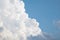 Unique White Fluffy Cloud Formation with Blue Sky