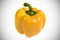 Unique yellow bell pepper. on white background with vignetting accent