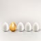 Uniqueness, individuality, different business creative concept. Vector illustration of white eggs and one golden egg
