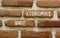 Unit economics symbol. Concept words Unit economics on brown brick wall. Beautiful brown brick wall background. Business and unit