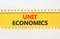 Unit economics symbol. Concept words Unit economics on yellow paper. Beautiful yellow table white background. Business and unit