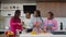 United african american family cooking in domestic kitchen