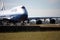 United Airlines Boeing 747 on runway.