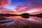 United Arab Emirates mountains view Wadi Al Qor Buraq Dam Sharjah and Ras Al khaimah at Sunrise time with water Reflection and red