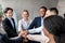 United Business Team Holding Hands Standing In Circle In Office