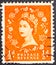 UNITED KINGDOM - circa 1952 1954: 1 2 pence orange used postage stamp with a portrait of Queen Elizabeth II, circa 1952