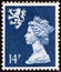 UNITED KINGDOM - CIRCA 1988: A stamp printed in Scotland shows Queen Elizabeth II and Royal Arms of Scotland, circa 1988.