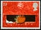 UNITED KINGDOM - CIRCA 1995: A stamp printed in United Kingdom shows European Robin in Mouth of Pillar Box, circa 1995.