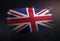 United Kingdom Flag Made of Metallic Brush Paint on Grunge Dark
