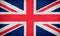 United Kingdom flag painted on brick wall. National country flag background photo