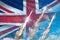 United Kingdom UK nuclear missile launch - modern strategic nuclear rocket weapons concept on blue sky background, military