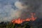 A United Nations helicopter extinguishes a fire on the Israel-Lebanon border