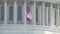 United States Capital - Close-up of the American Flag flying in the wind on the Capital Building
