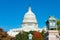 United States Capitol Building with Colorful Trees and Fancy Lights during Autumn in Washington D.C.