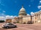 United States Capitol Building in Washington DC - East Facade of the famous US landmark with police car in front.