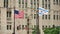 United States and Chicago Flags Waving on Michigan Bridge