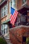 United States flag on an old vintage porch