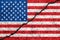 United States flag painted on cracked wall background/USA divide