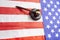 United states flag with wooden gavel on it
