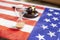 United states flag with wooden gavel and hourglass on it