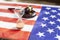 United states flag with wooden gavel and hourglass on it