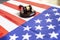 United states flag with wooden gavel on table