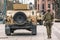 United States Marine Corps soldiers with weapons, helmets and armored vehicles humvee