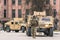 United States Marine Corps soldiers with weapons, helmets and armored vehicles humvee