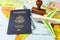 United States passport, stamp, airplane and boarding pass on a map of the world. Business trip. Holiday and adventure. Documents