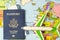 United States passport, stamp, airplane and boarding pass on a map of the world. Business trip. Holiday and adventure. Documents