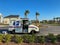 A United States Postal Service, USPS,  Truck making deliveries in an suburban area