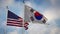 United states and south korea cooperation and friendship shown by flagpoles