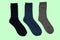 Universal warm socks on green background.