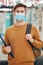 University student and covid portrait of man with face mask protection for virus transmission. Responsibility and