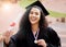 University winner, woman portrait and graduate degree with school achievement outdoor with medal. Female person