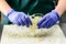 Unknown chef preparing Falafel roll, close-up. Vegetarian takeaw