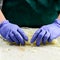 Unknown chef preparing Falafel roll, close-up. Vegetarian takeaway food, step by step recipe