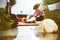 Unknown human hands cooking in kitchen. Woman is busy with vegetable salad. Healthy meal, and vegetarian food concept