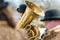 Unknown man plays wind musical instrument.